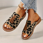 Sandálias rasas decoradas com franjas no estilo étnico feminino, sandálias de férias na praia, antiderrapantes para uso ao ar livre, chinelos elegantes e versáteis.