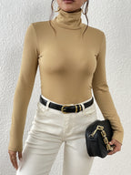 Top de corte alto de manga comprida para mulher - Mistura de poliéster preto elástico, corte casual chic com detalhe de botão, perfeito para outono/inverno, top casual chic|Estilo minimalista|Mistura de poliéster