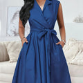 Elegant Sleeveless A-Line Dress with Belt Detail