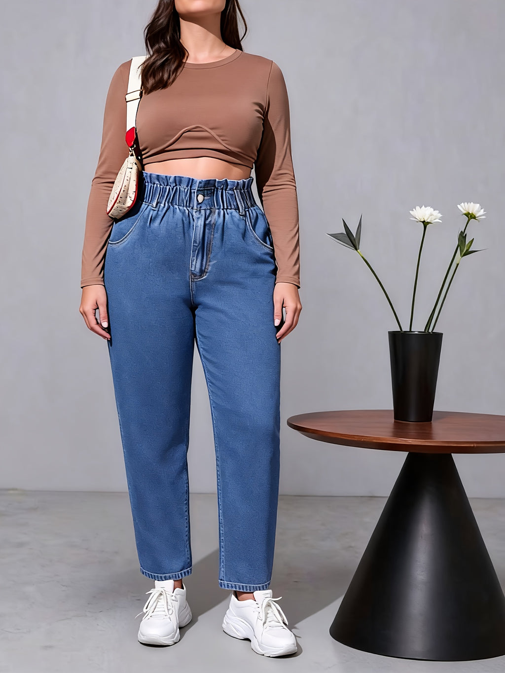 Calças jeans femininas plus size de cintura alta e afunilada, estilo casual e elegante, adequadas para todas as estações