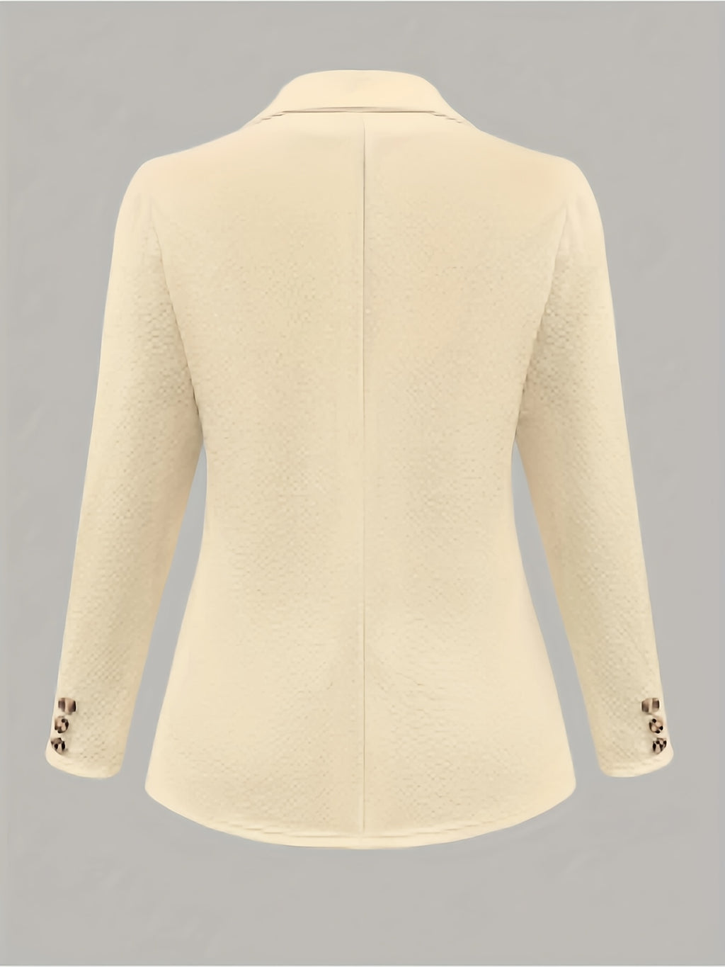 Um casaco de fato de cor sólida elegante e com estilo.