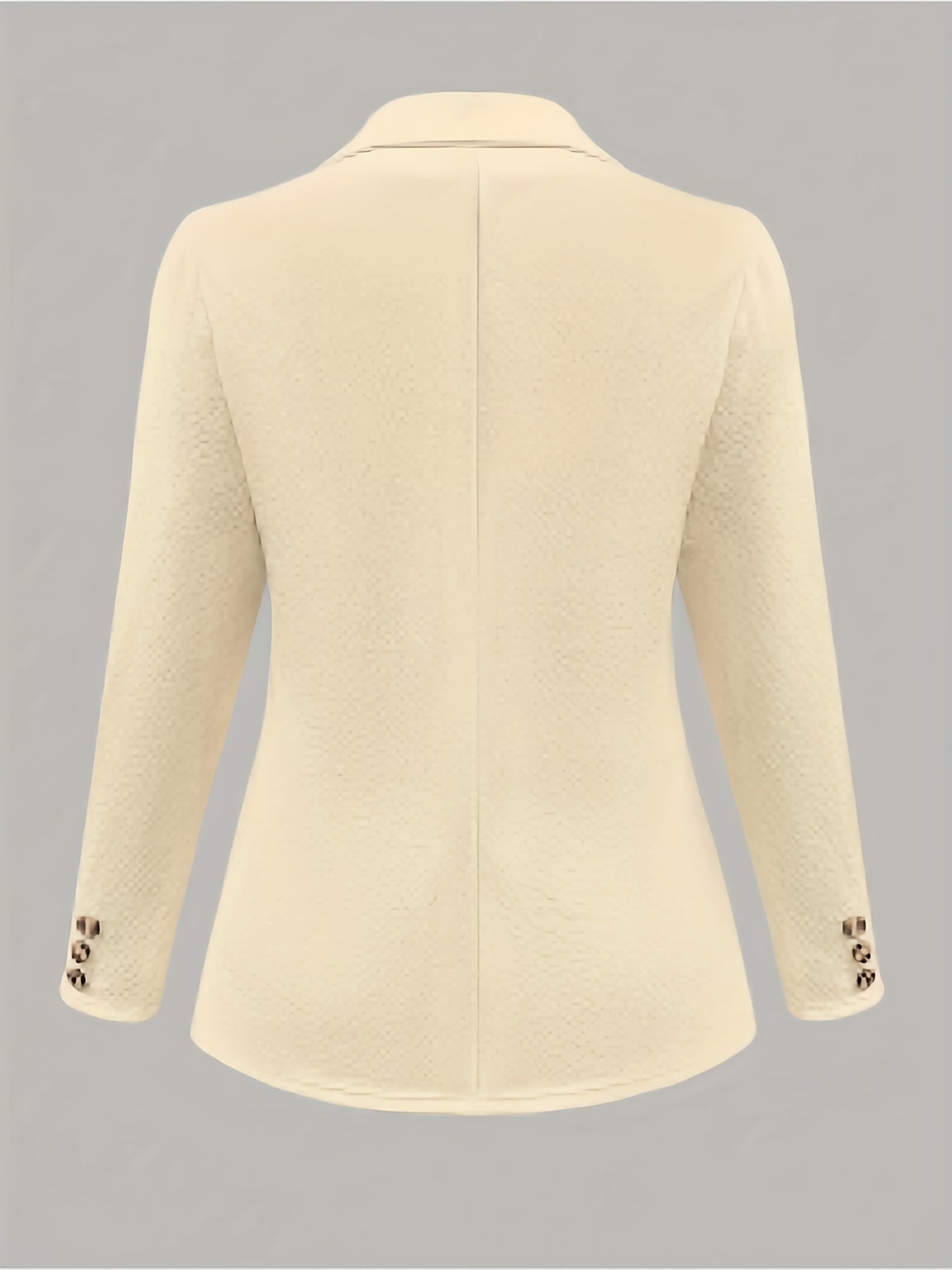 Um casaco de fato de cor sólida elegante e com estilo.