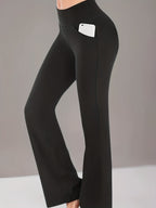 Um par de calças casuais de corte folgado para mulher, com pernas abertas, controlo abdominal e efeito lifting nas ancas, completas com bolsos. Fabricadas com tecido suave e agradável ao toque, oferecem uma sensação de conforto.