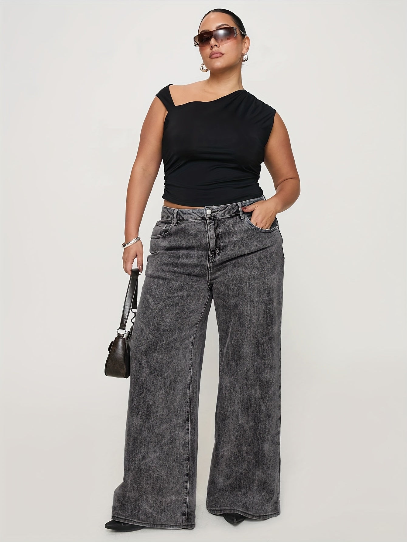 Jeans de ganga de tamanho grande para mulher, calças de perna larga cinzentas modernas e fashion para estilo europeu e americano, confortáveis e versáteis.