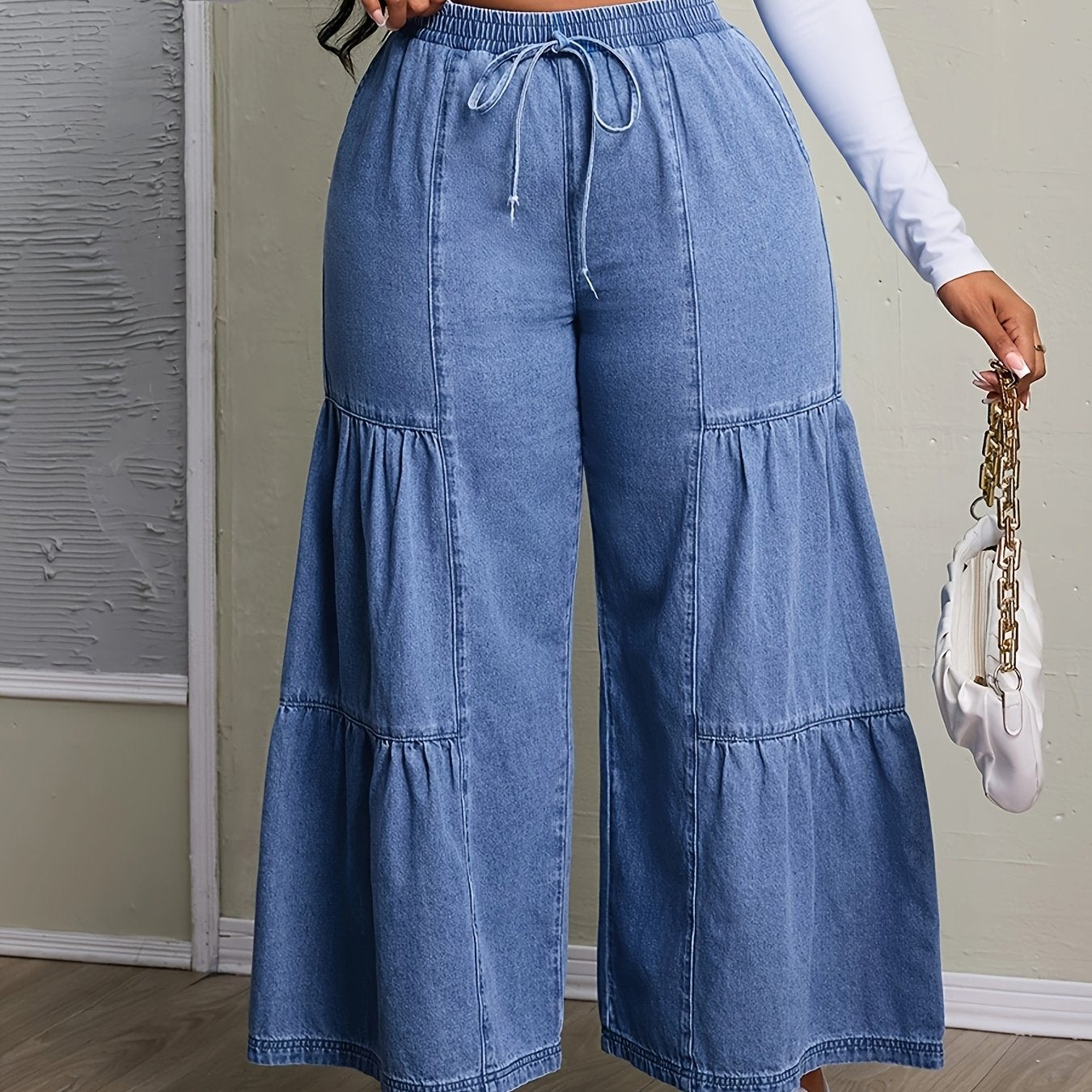 High-Waisted Wide Leg Jeans with Ruffle Hem
